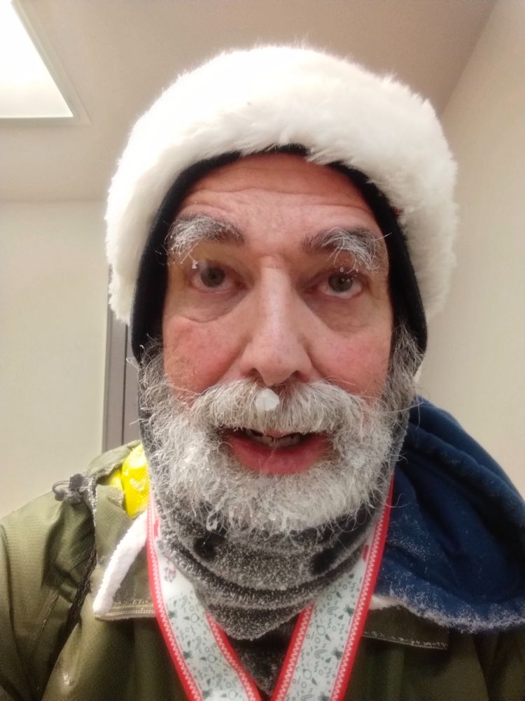 A selfie in the bathroom before I washed the ice out of my beard. Look at the frost on my hoodie, pushed over to my left shoulder. 