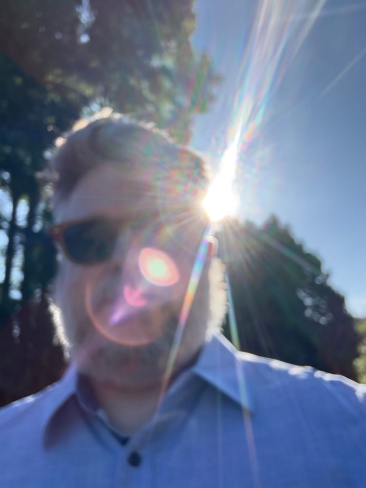 Blurry self portrait with the sun