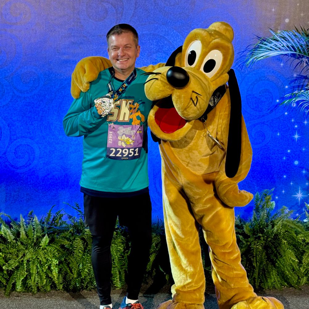 Chuck Sweatt with Goofy 5K medal at Disney Marathon Weekend