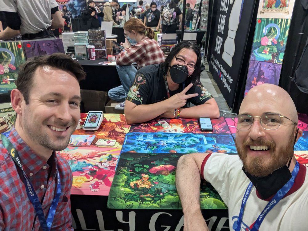 Taking a selfie with my friend Dan and our friend, the artist Migzy_Co in front of their work on display at the Philly Game Shop booth!