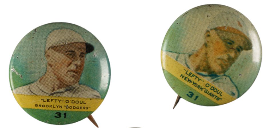Two colorful 1933 pins of baseball player Lefty O'Doul. One shows him on the Brooklyn Dodgers and the other shows him with the New York Giants, reflecting a midseason trade. The two images use identical poses, but adjusted the color of his cap to fit his teams.