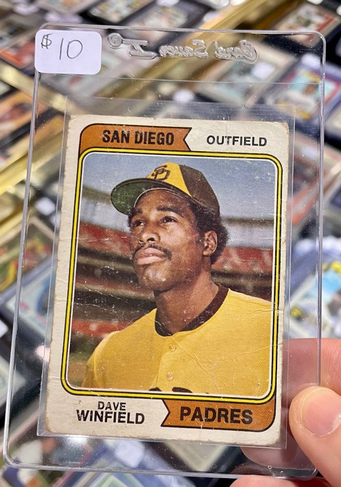 1974 Topps baseball card of Hall of Face outfielder Dave Winfield. It's priced $10.