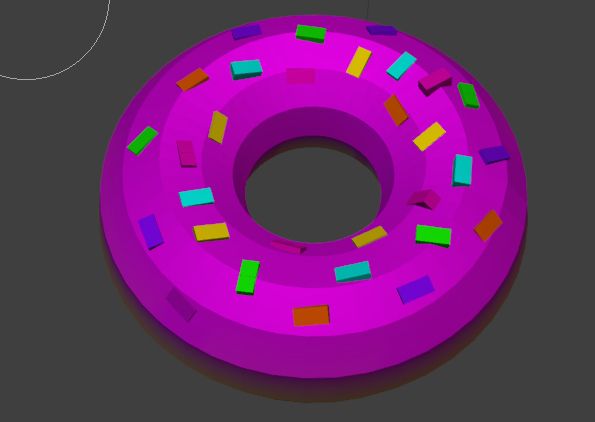 A 3-D model of a donut that I made in blender. It has pink icing and blue, green, yellow, orange, pink and purple sprinkles on top.