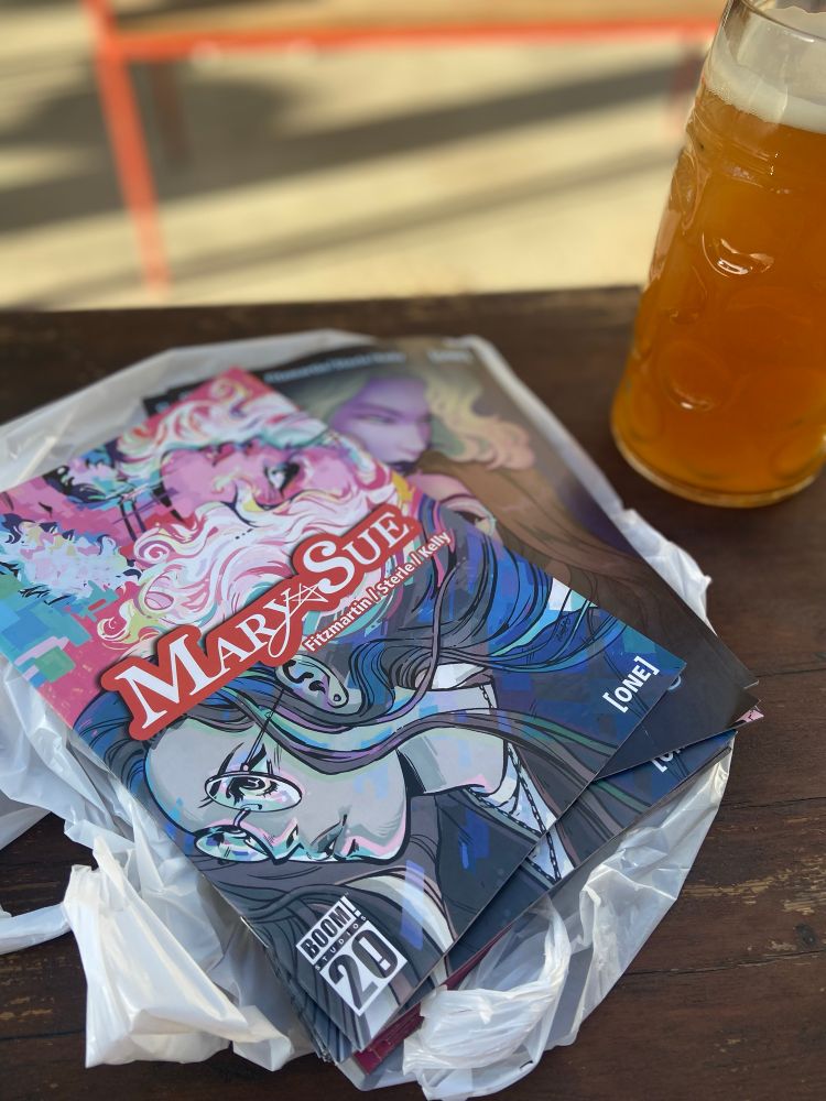 The Mary Sue issue 1 covers next to a large, well deserved beer. 