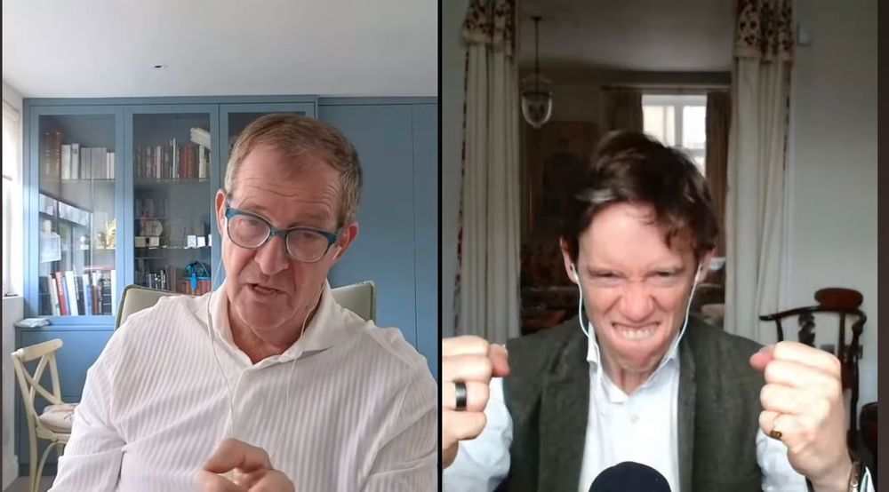 "The Rest Is Politics" video podcast screen grab on the 5th September 2025.

Alastair Campbell is on the left with blue glass frames on and a white shirt, raising his finger to point to the Camera, looking quite surly over TV producers nuking his phone with calls to appear on their shows in relation to Angela Rayner's resignation as the UK Deputy Prime Minister.

Rory Stewart is on the right of the screen in his Star Wars Han Solo style outfit, with a very amused "Fight me!" look on his face, grinning and squinting eyes, with fists raised in the "Guard" position.

For the full podcast go to www.therestispolitics.com or search for "The Rest Is Politics" on YouTube or wherever you get your podcasts.