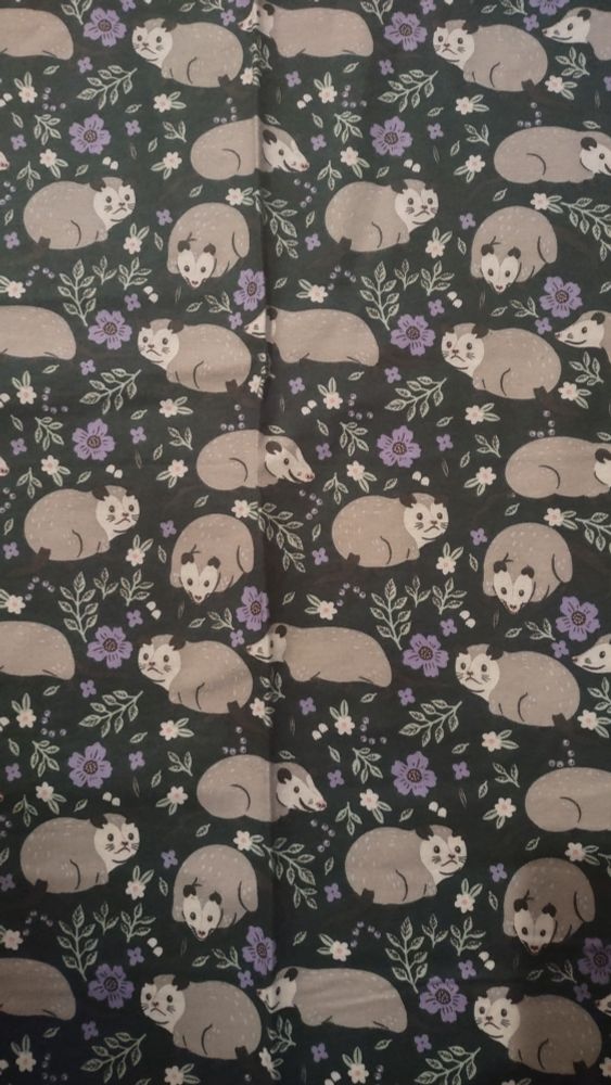 Fabric with possums on it.