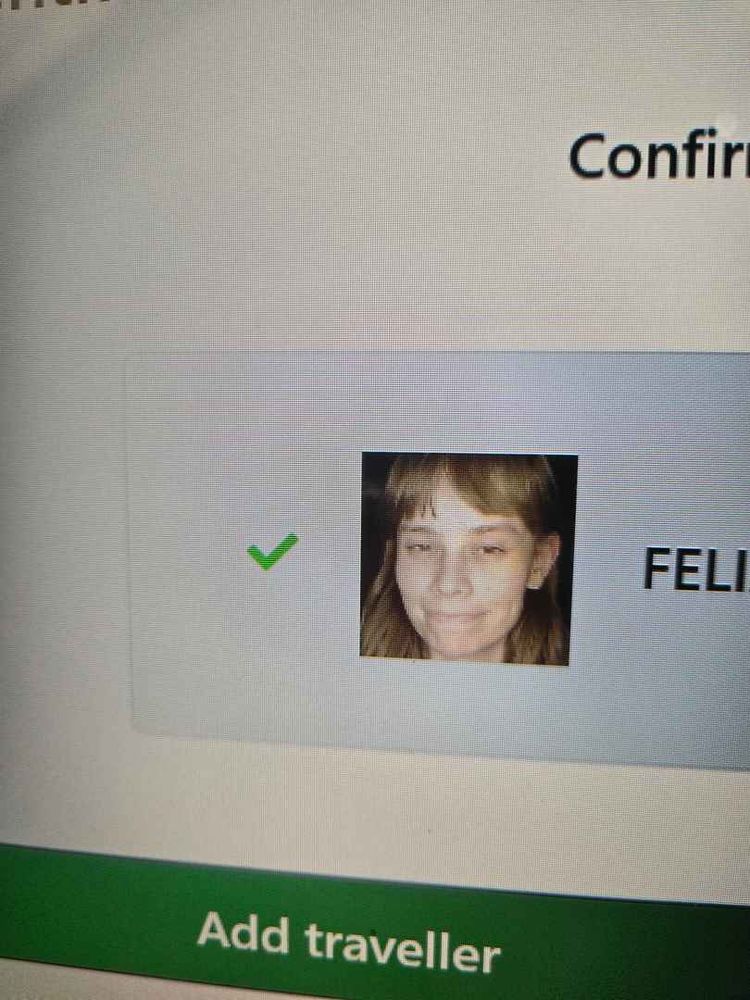 Me with a very sleepy facial expression, captured by a Canadian re-entry border kiosk camera