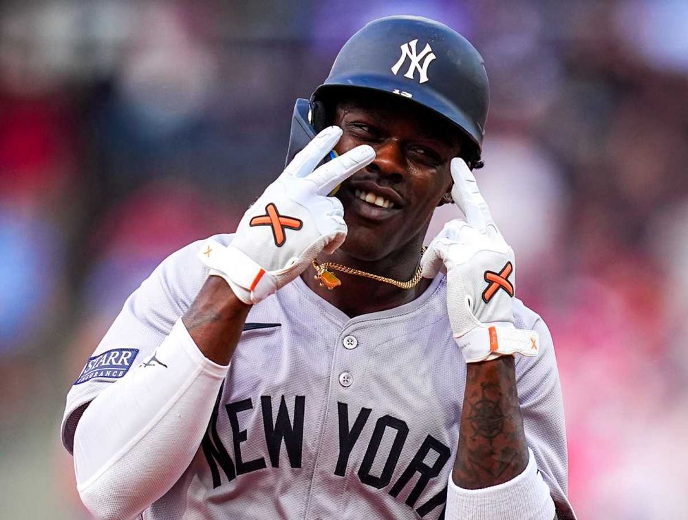 Picture of Jazz Chisholm Jr. appearing to hold up 3 fingers