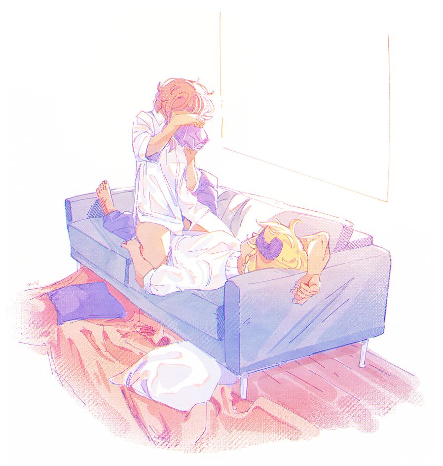 A young brunette woman (Kamelia) dressed in an oversized white dress shirt is taking a picture of her lover, a blonde-haired satyr wearing a white turtleneck sweater (Harki). He is laid and posed on the couch, with the woman sitting on top of him to snap a photo with a black video camera. Light pours heavily into the room through the window, while a few pillows and a blanket are strewn on the wooden floor.