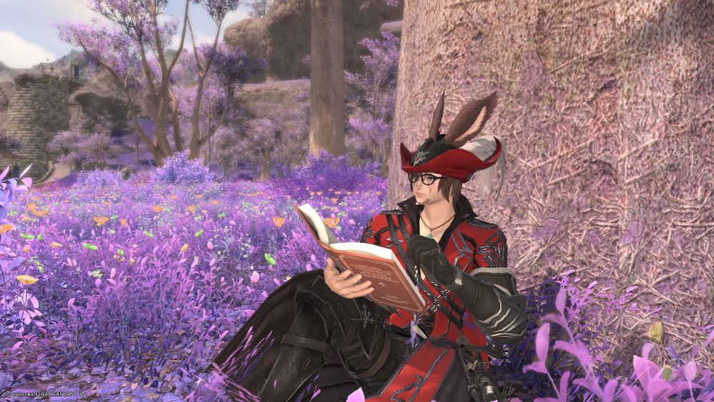 Xelcron's character in final fantasy xiv, reading a book against a tree in lakeland