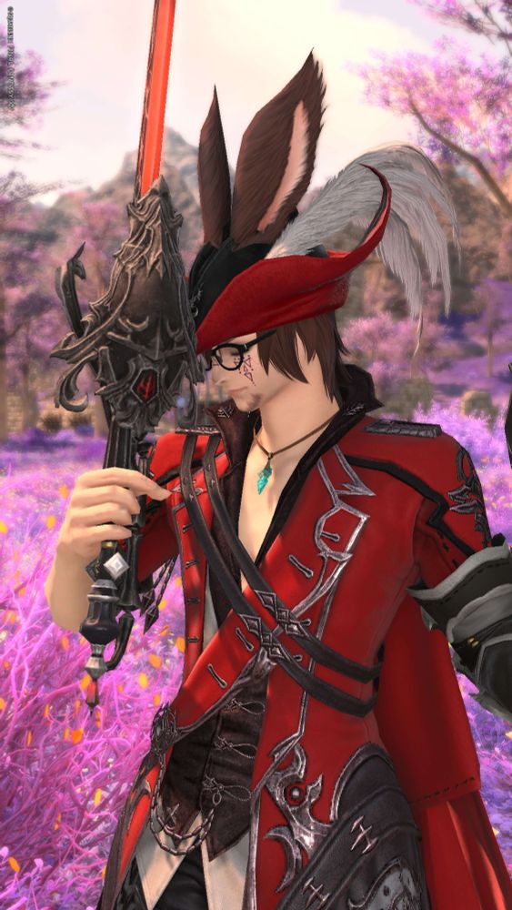 Xelcron holding up his blade in victory