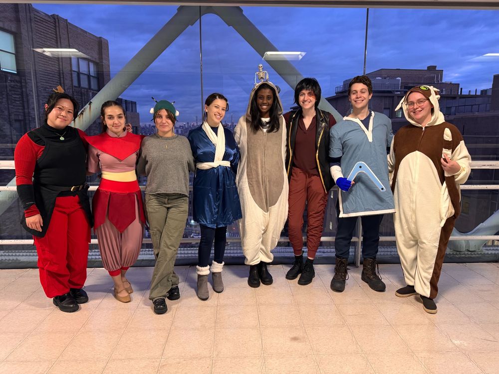 A group of 8 people dressed as characters from the TV show Avatar: the Last Airbender.