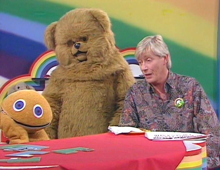Bungle and Geoffrey look tensely at that rogue bastard, Zippy. 