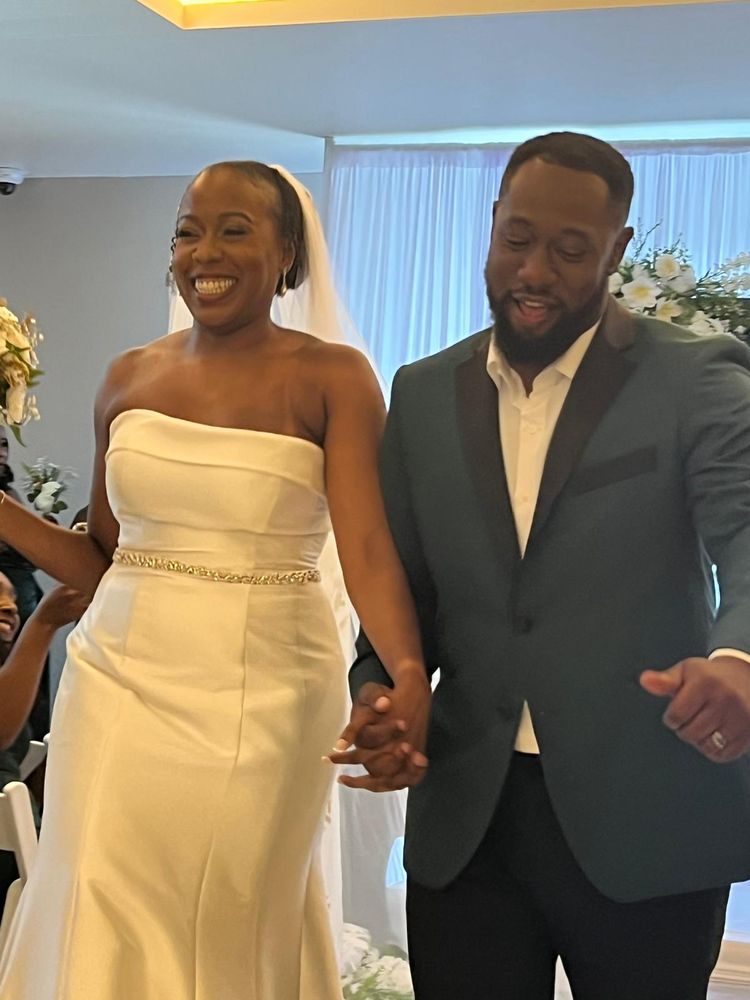 KC and Khea walking down the aisle post Wedding ceremony