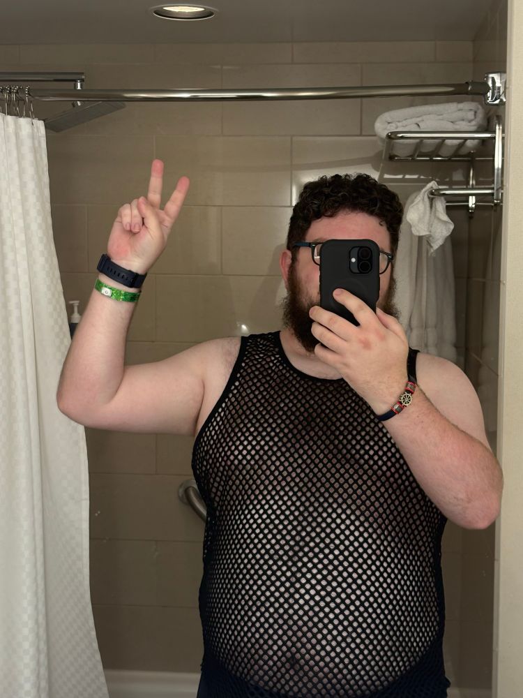 Me in a sleeveless mesh top 