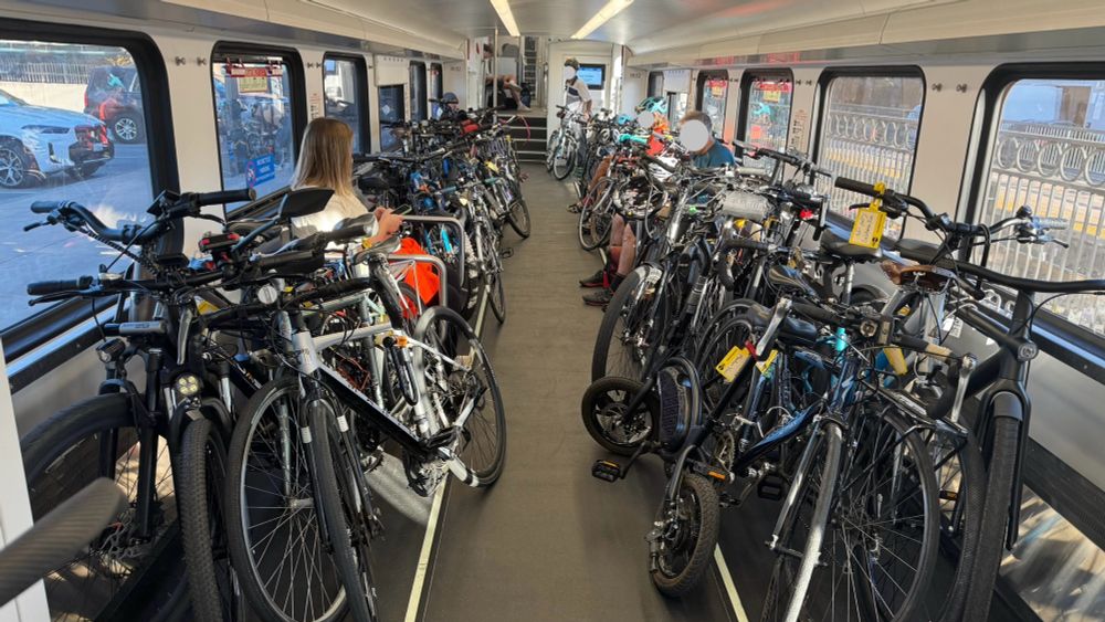 A Caltrain bike car completely packed with bikes.