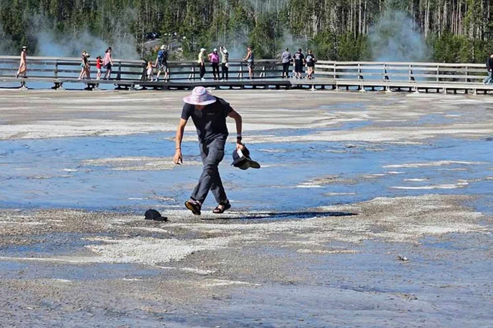 A Yellowstone National Park visitor was recently spotted walking in flip-flops across an off-limits zone. Photos of the incident were shared on Facebook, where an anonymous poster said the man walked ...