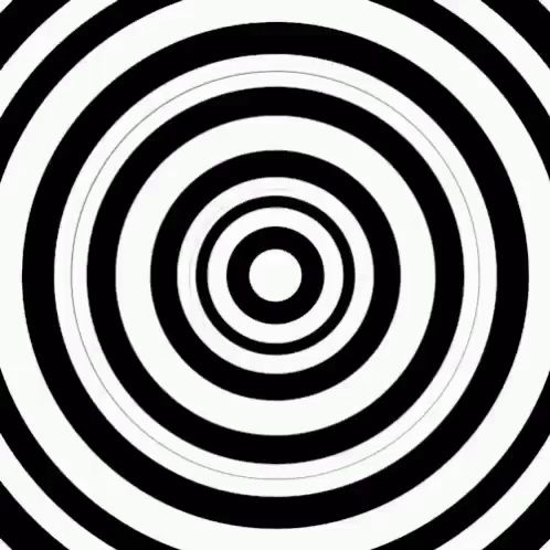 a black and white optical illusion with a circle in the middle