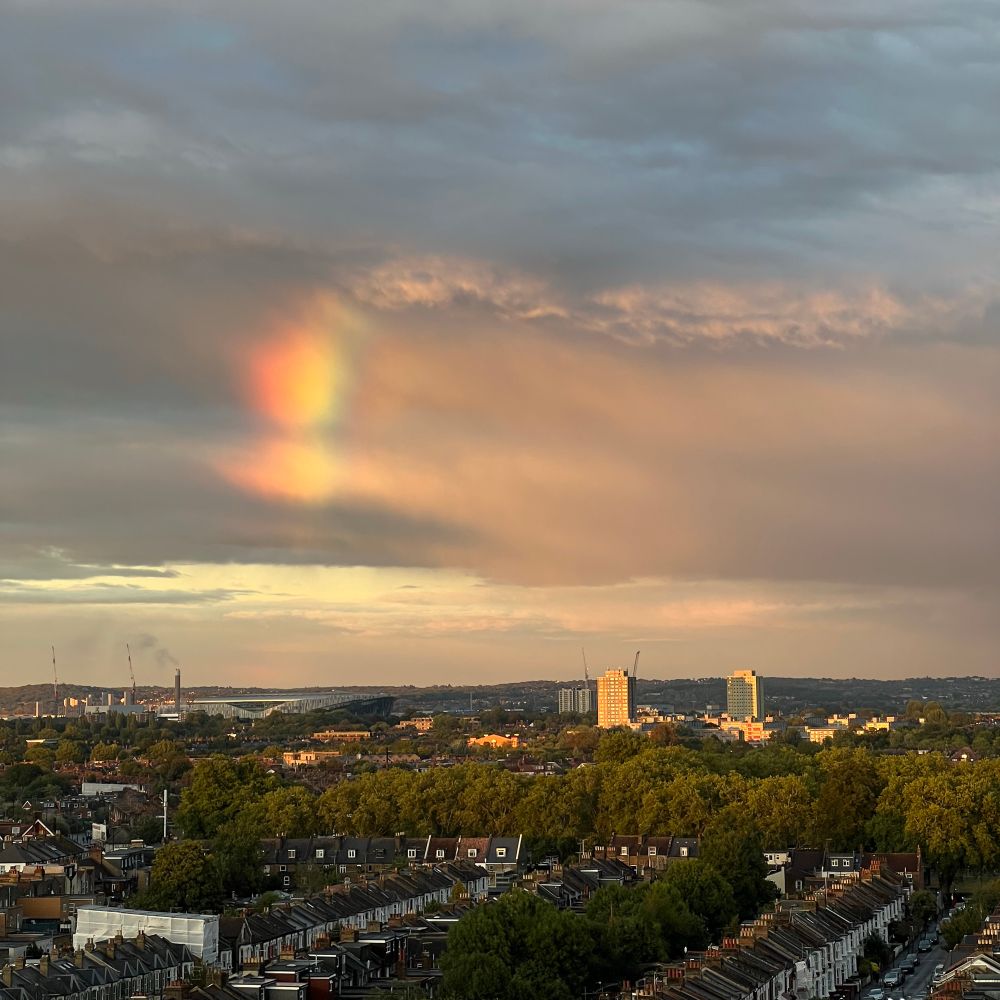 View over Tottenham showing a rainbow inside a cloud