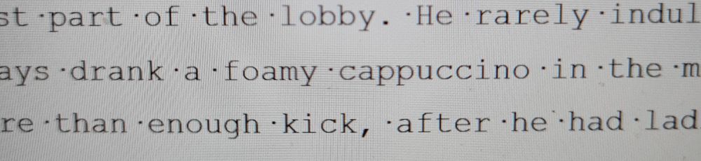 Textauszug aus Manuskript, in Courier New: "always drank a foamy cappuccino"
