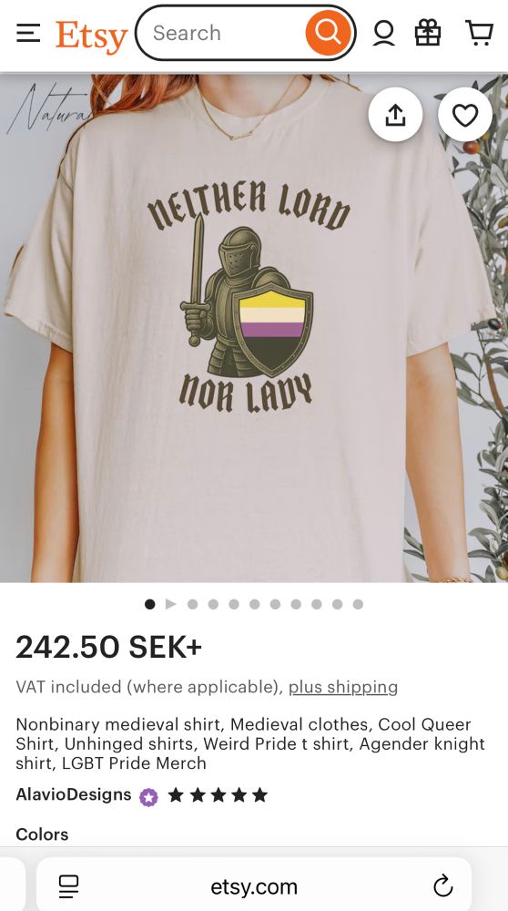 Screenshot of a T-shirt being sold on Etsy. The shirt has text reading ”neither lord nor lady”. There is also a knight wearing armour, while holding a sword and a shield that’s painted in yellow, white, purple, and black (the colours of the non-binary flag).
The shirt is sold by AlavioDesigns.