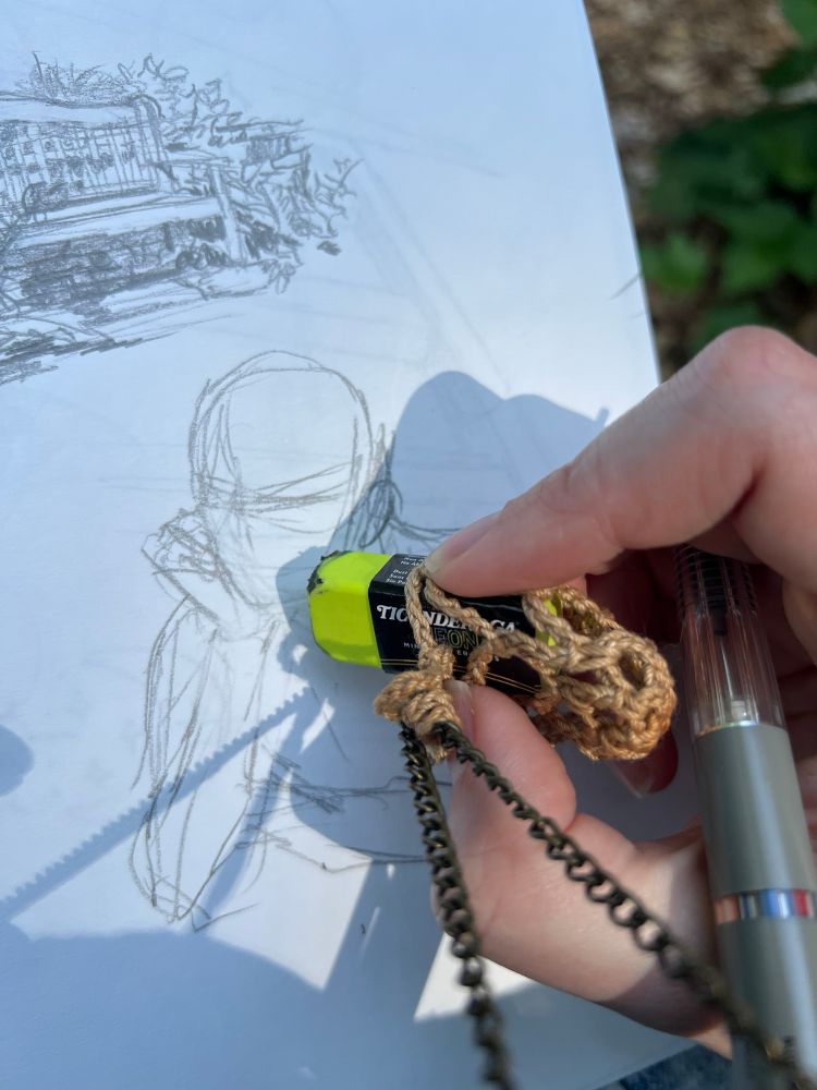 The object inside the bag is a small eraser, used for sketching on-the-go.