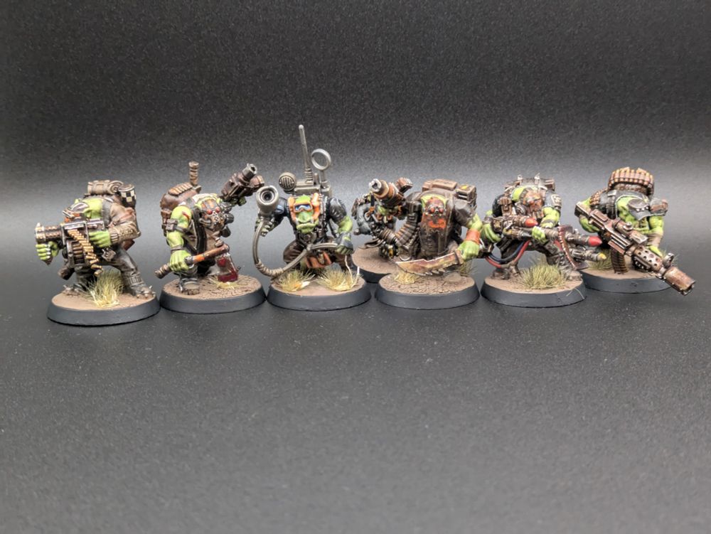 Ork Kommandos including Snipa Boy, Rokkit Boy, Dakka Boy, and kitbashed Comms Boy.