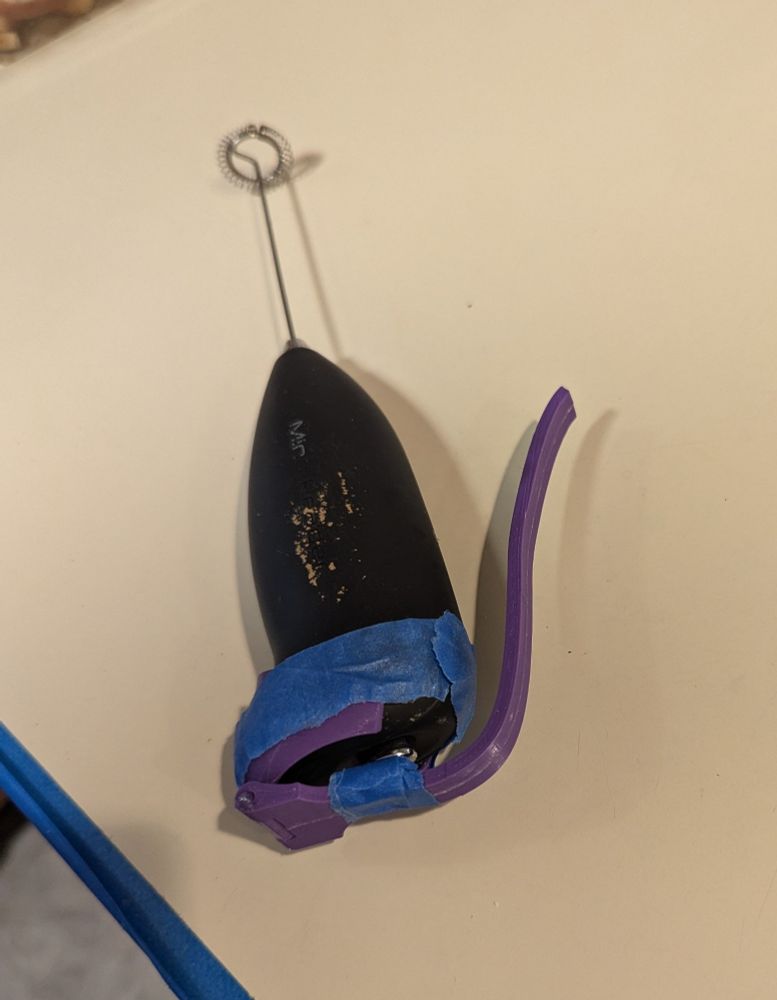 Milk brother with pull lever mechanism hastily taped on.