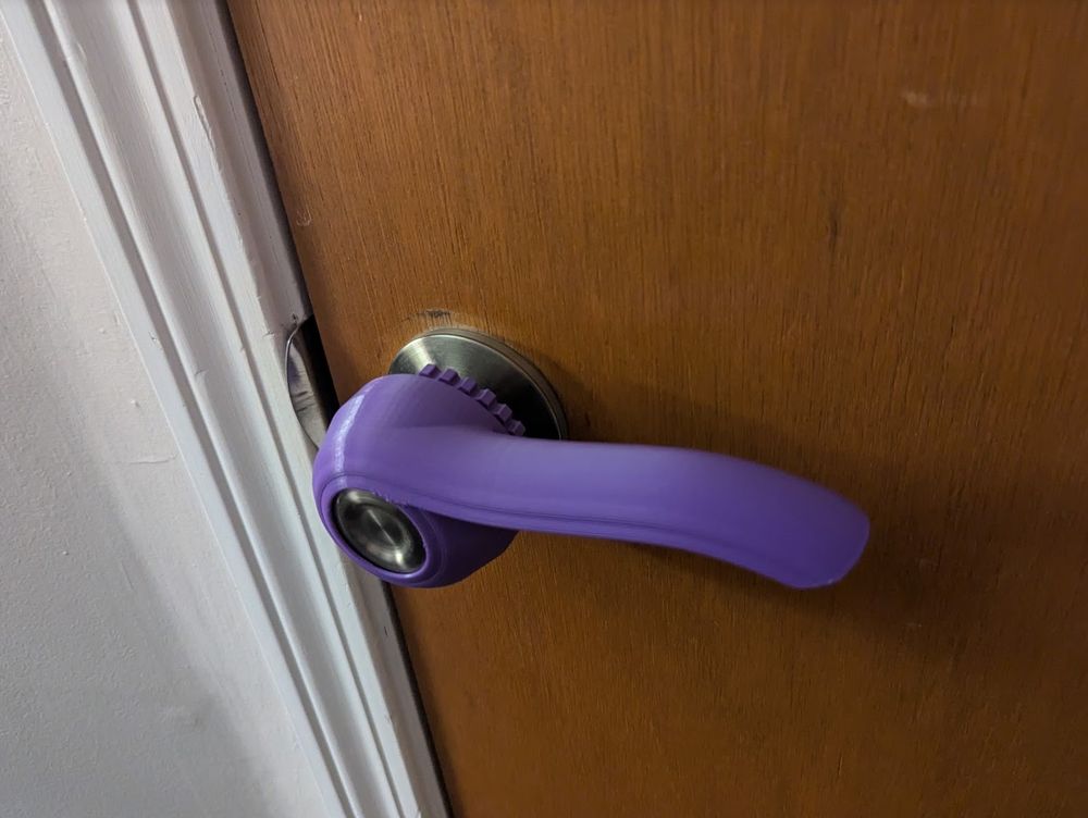 Door knob with 3d printed handle adapter for arthritis/accessability.