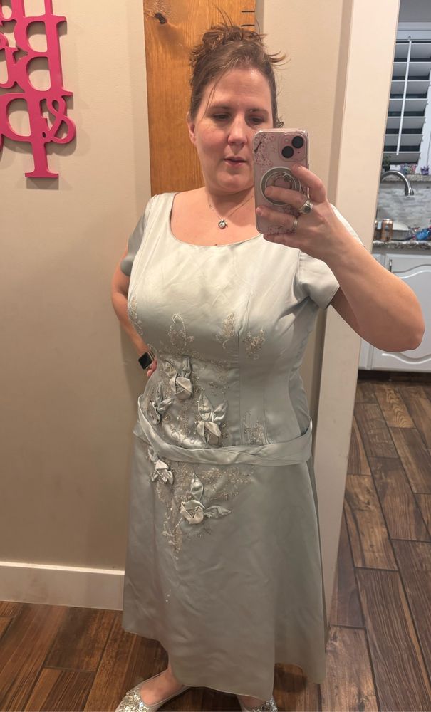 Me wearing an altered and repaired vintage 1950s dress.