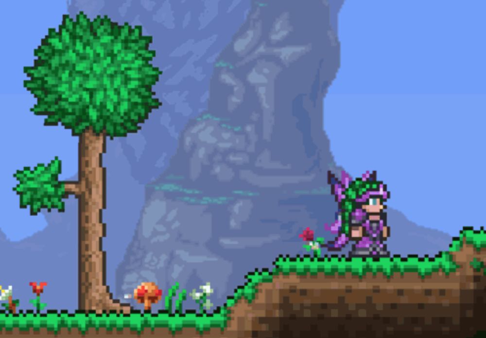 a pixel art scene with a tree and a fairy