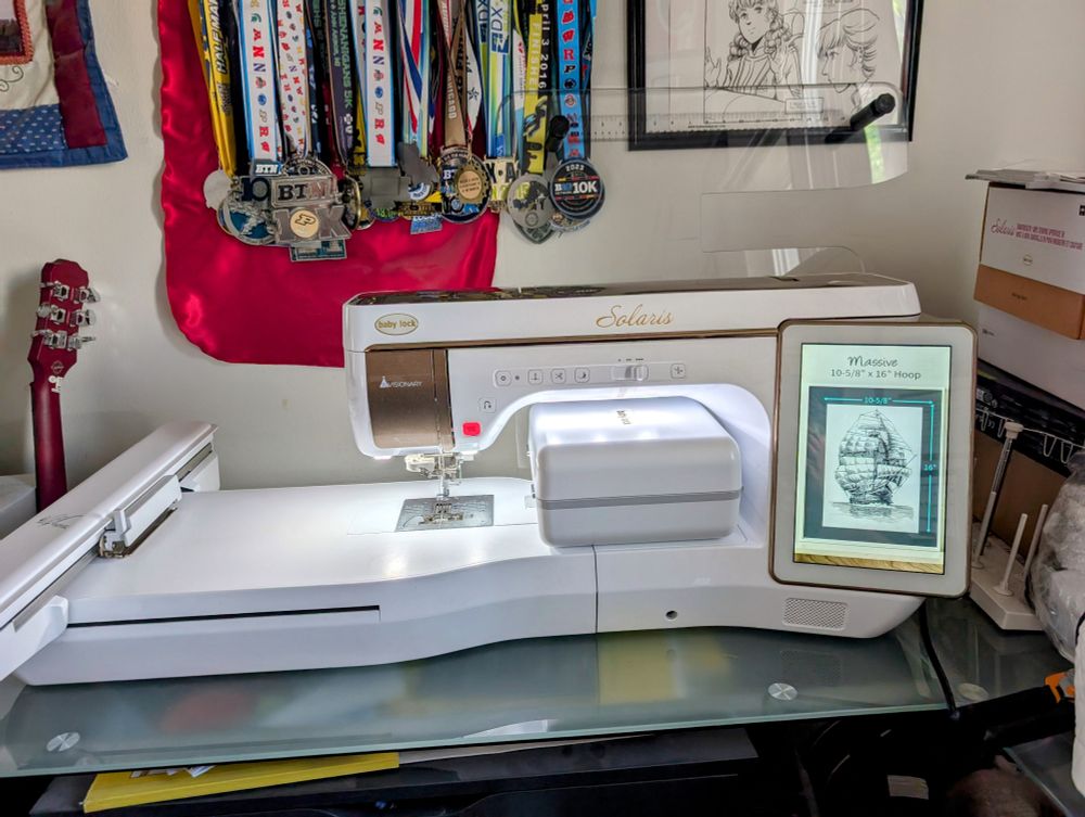 BabyLock Solaris II sitting on table and ready to stitch. 
