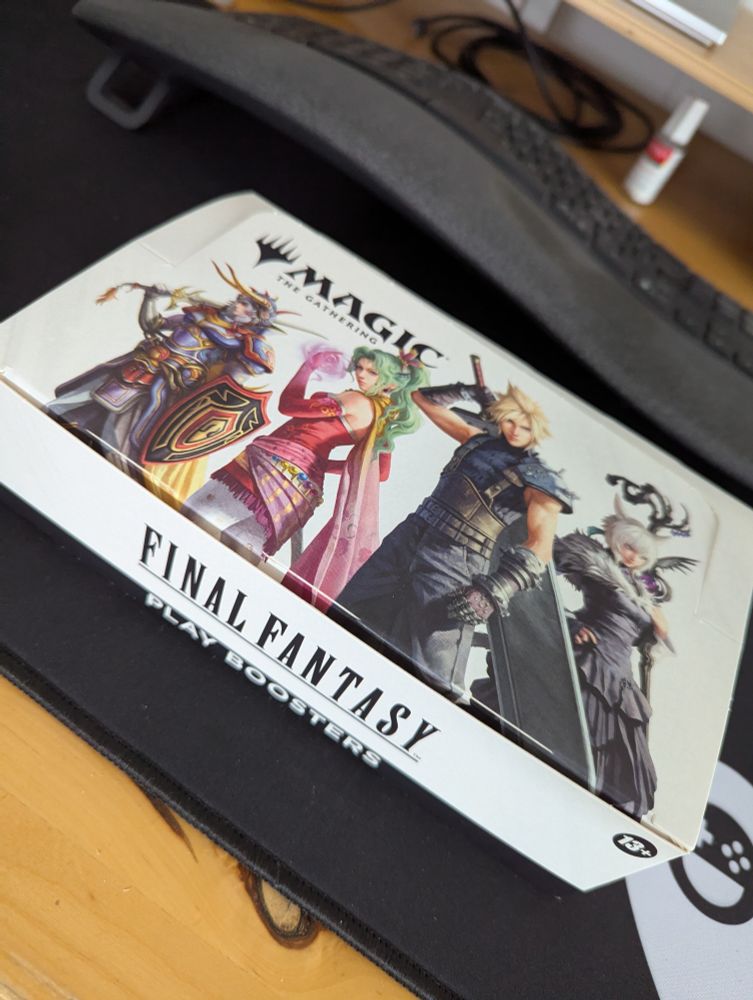 A box of Final Fantasy Magic the Gathering play boosters
