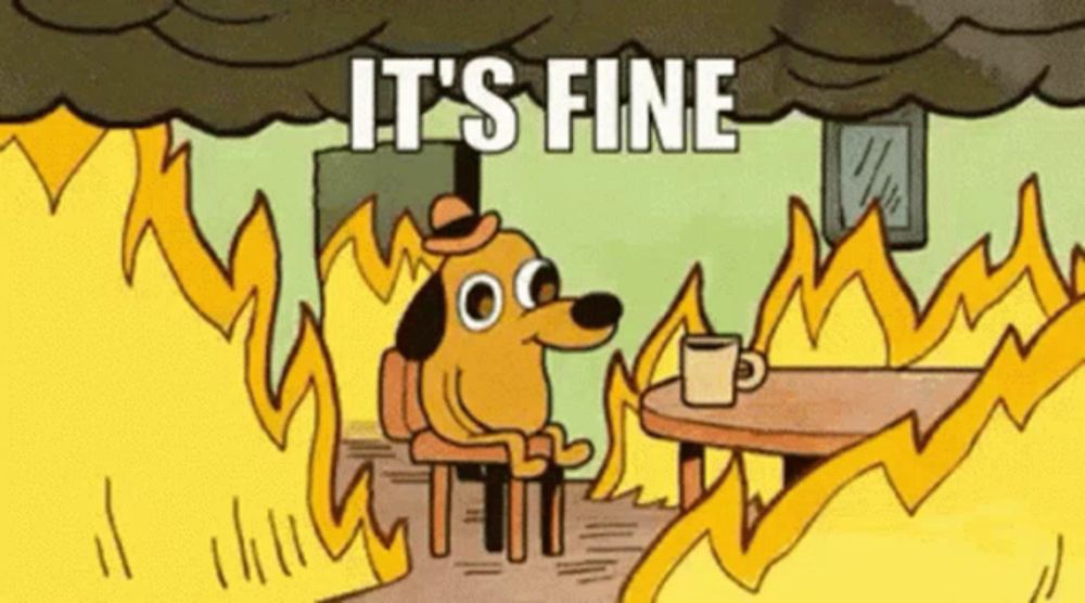 a cartoon dog is sitting at a table in front of a fire with the words `` it 's fine '' written above him .