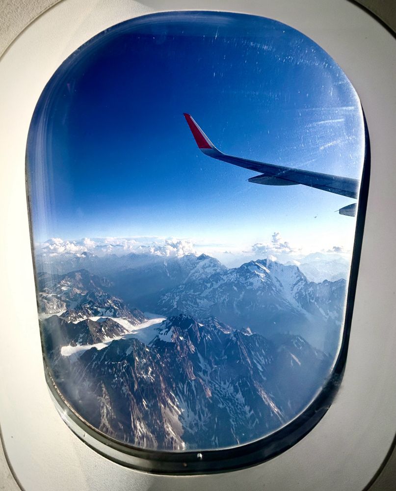 View of Andes mountains from the window of an airplane.