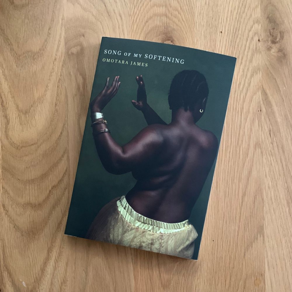 Shiny new copy of Omotara James’ debut poetry collection, Song of My Softening, laying on my kitchen island. 