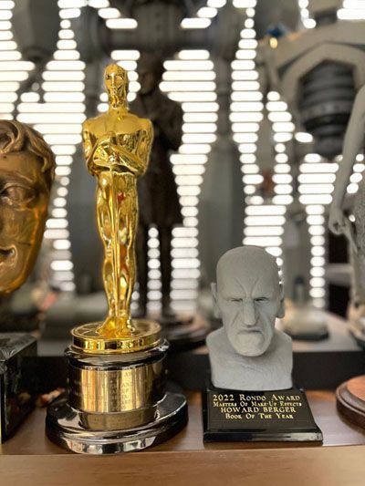 Image of an Oscar next to a Rondo Award