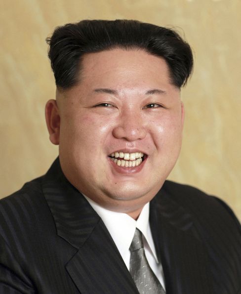 Picture of smiling Kim Jong-Un.