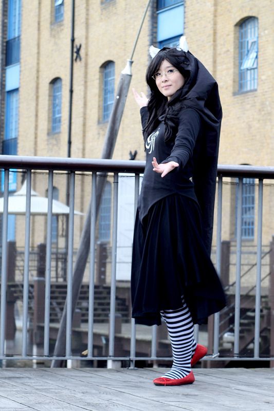 photo of a cosplayer dressed as god tier jade from homestuck