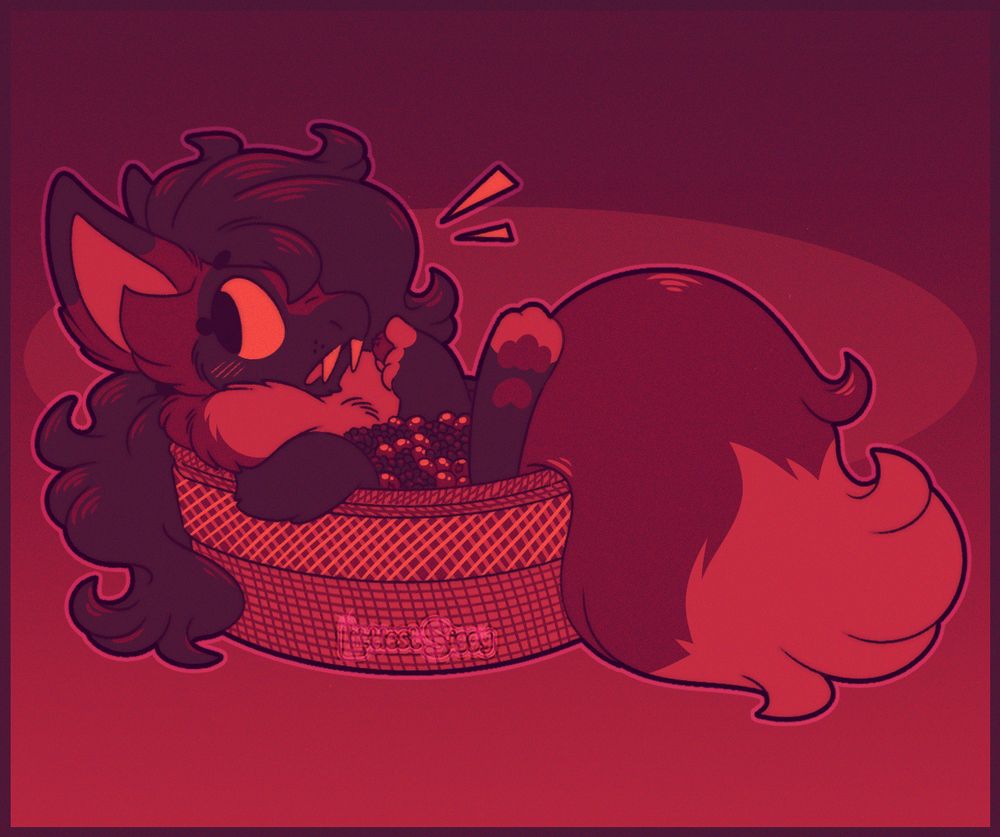 chibi ollie sitting in a basket of berries