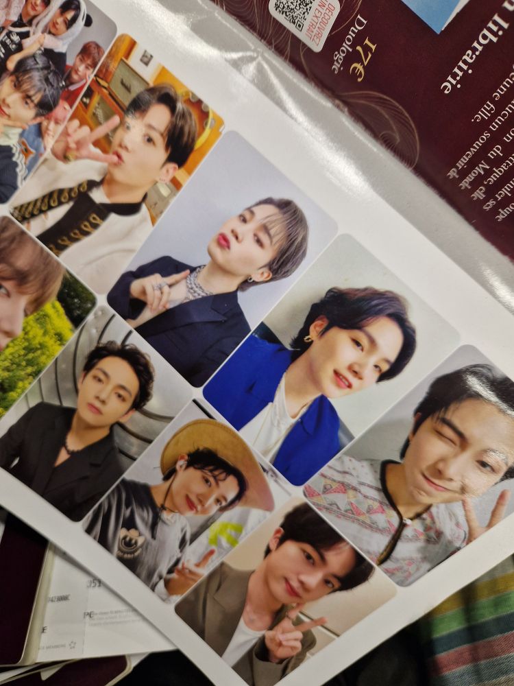 Goodies from magazine include BTS photocards...