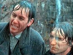 Withnail and Marwood in the rain. At this moment Withnail is probably saying We've gone on holiday by mistake