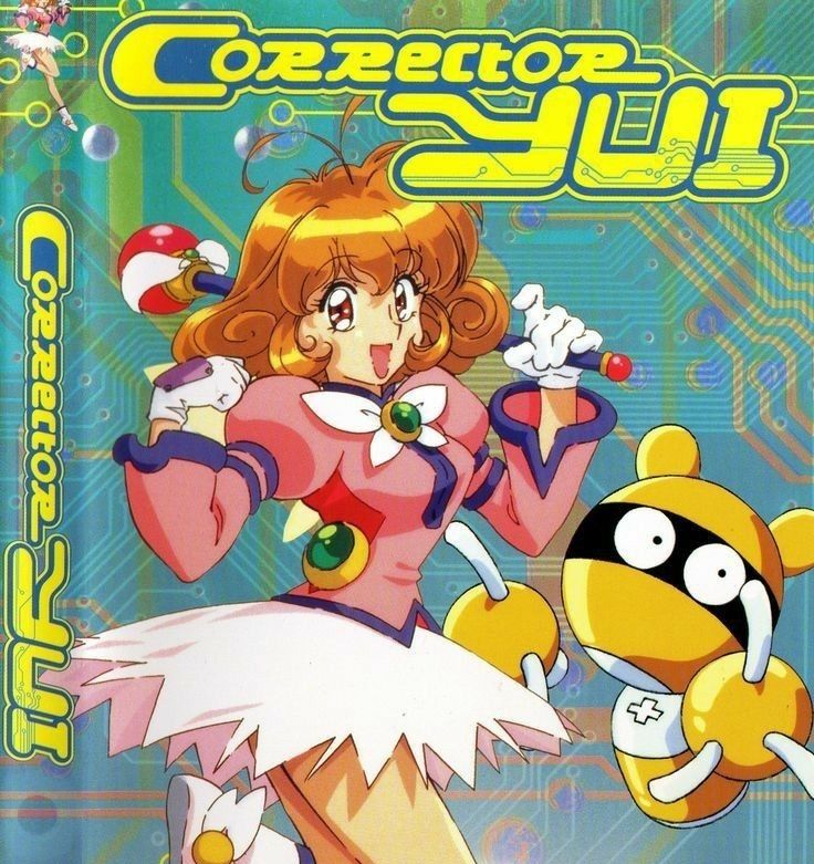 Capa de um DVD do Mahou Shoujo "Corrector Yui", onde Yui está com sua roupa de transformação ao lado de seu mascote, um pequeno robô amarelo. Esse anime também é um shoujo onde a protagonista faz downloads para poder se transformar.