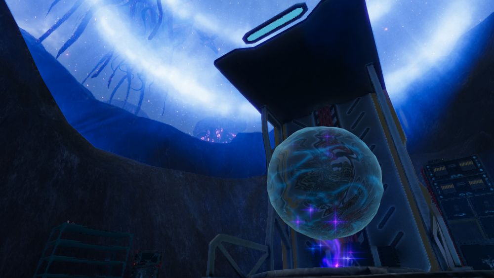 Rendu 3D du jeu Dernier Départ. On est entouré de roches, comme dans un canyon. Des appreils électroniques entourent l'élément central : un téléporteur géant. La Sphère du Souvenir est dans le téléporteur, prête à partir, on observe l'aura bleue du mécanisme recouvrir tout le ciel.
