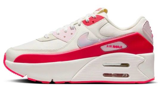 Stock image of a Nike Air Max 90 LV8 in the 'Sail Siren Red' color way which is a white body with neon red accents and a pink iridescent Nike swoosh