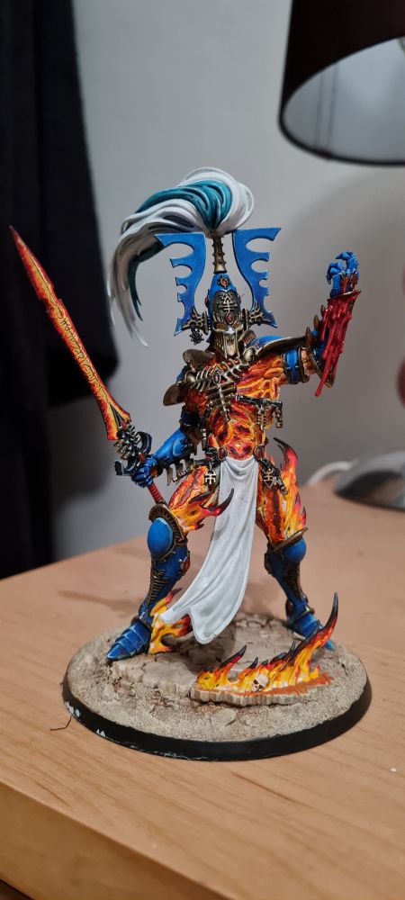 Avatar of Khaine mini wearing blue armour