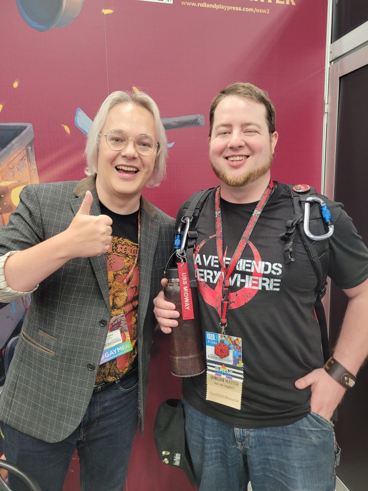 Myself and Mark/Mara getting a picture together at Gencon 2025!