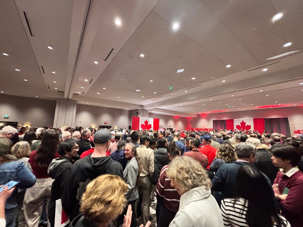 Large crowd waiting for Prime Minister Carney. 