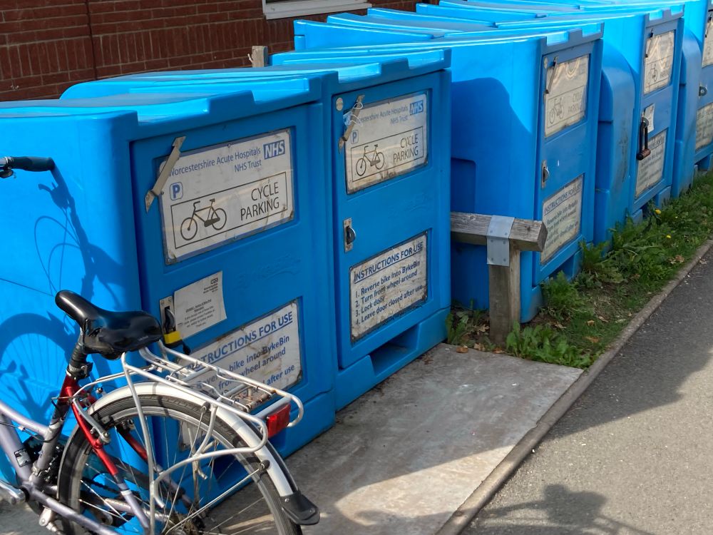 Single blue plastic bike stores with end access