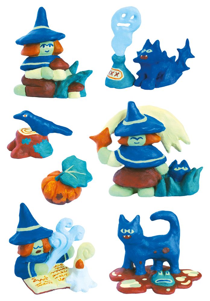 Figurines featuring a witch and her cat, a pumpkin and a crow.
